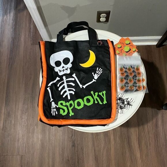 Light up trick or treat bag. NWOT. Comes with extra goodies. - Picture 3 of 6